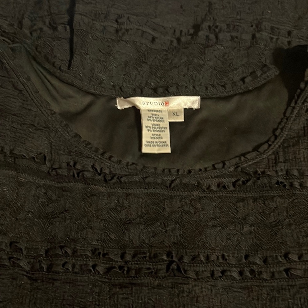 Black summer dress with detail throughout